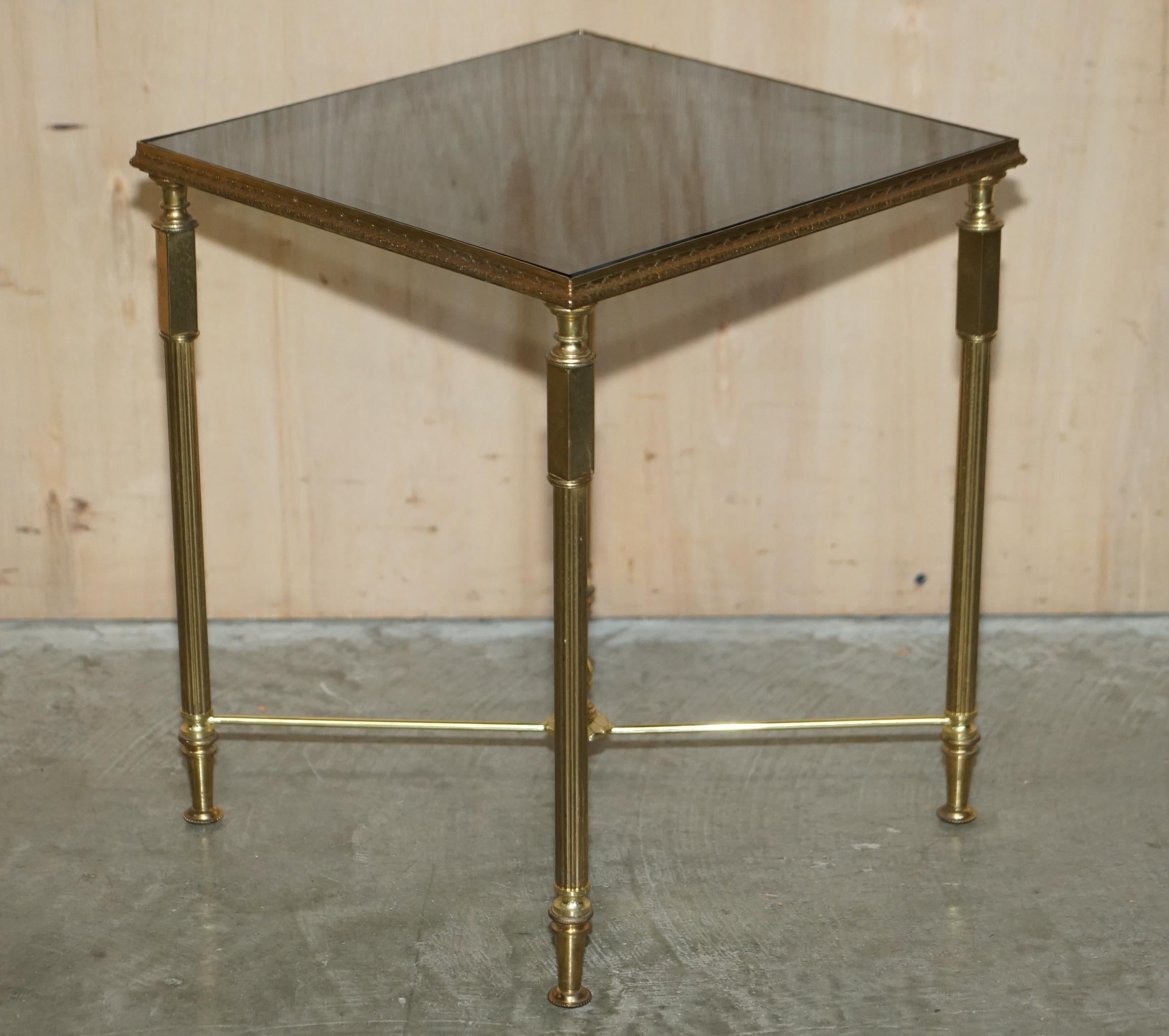 We are delighted to offer for sale this lovely original pair of circa 1950’s Mid Century Modern Maison Jansen Paris side end tables.

This table is very much on trend and will never be far from it, the lines are elegant and timeless and it looks