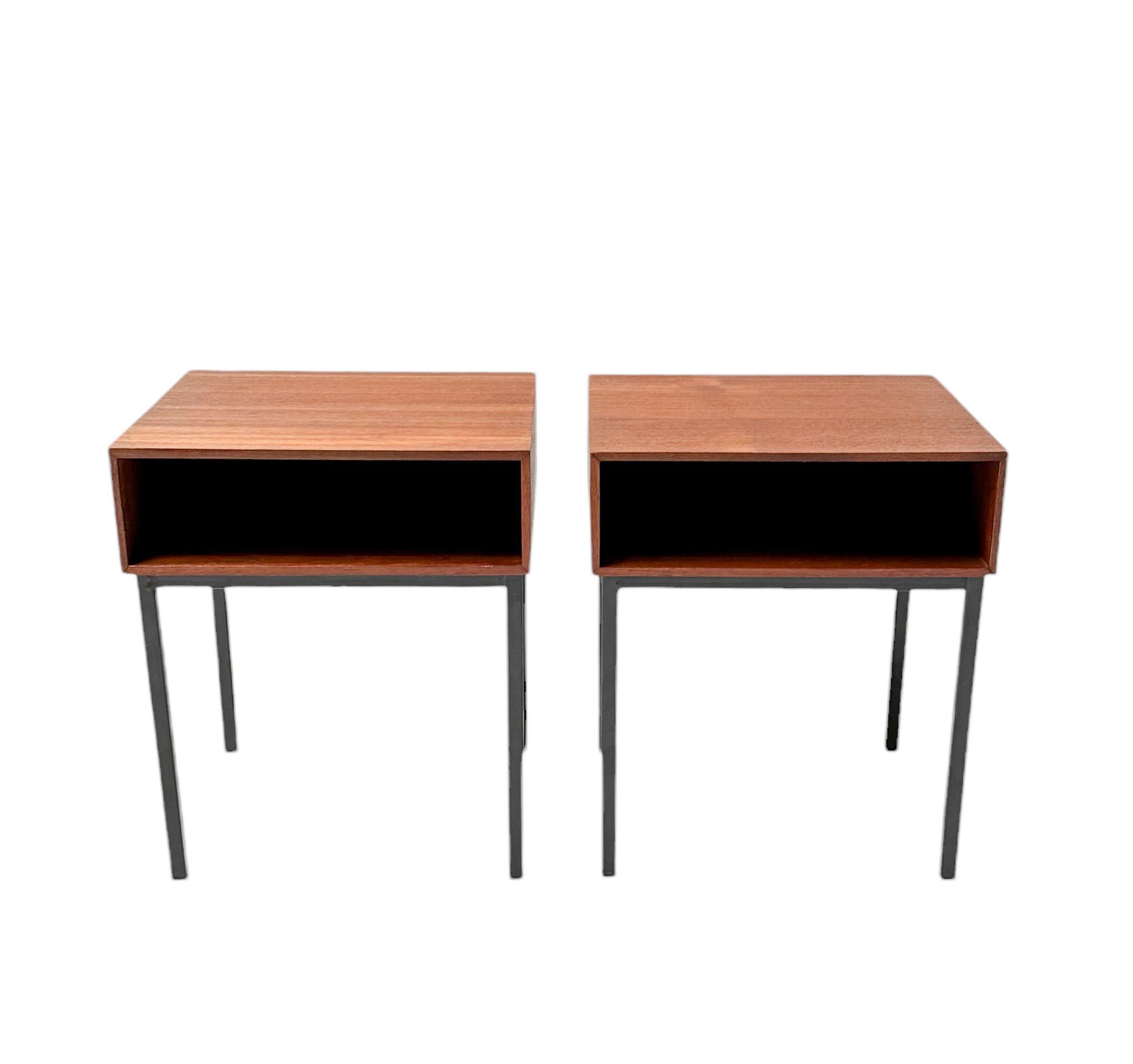 Stunning and elegant pair of Mid-Century Modern nightstands or bedside tables.
Striking Dutch design from the 1960s.
Original teak veneered frames on original black lacquered feet.
This wonderful pair of Mid-Century Modern nightstands or bedside