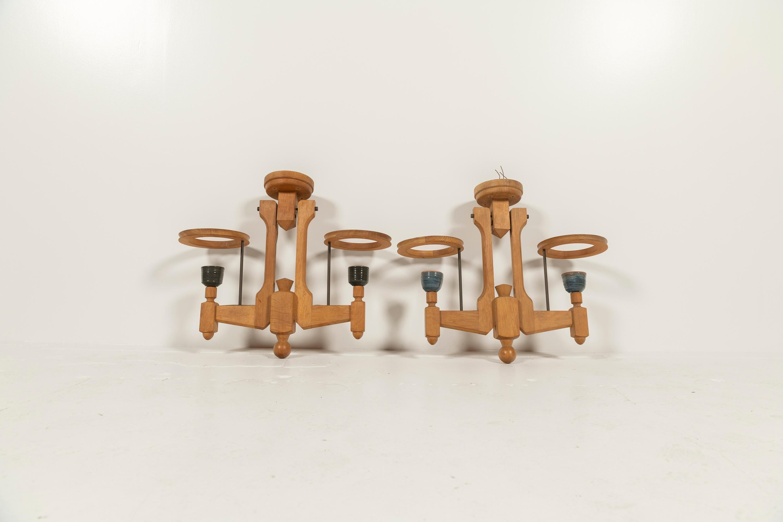 French Two Mid-Century Modern Oak and Ceramic Chandeliers by Guillerme & Chambon, 1960s For Sale