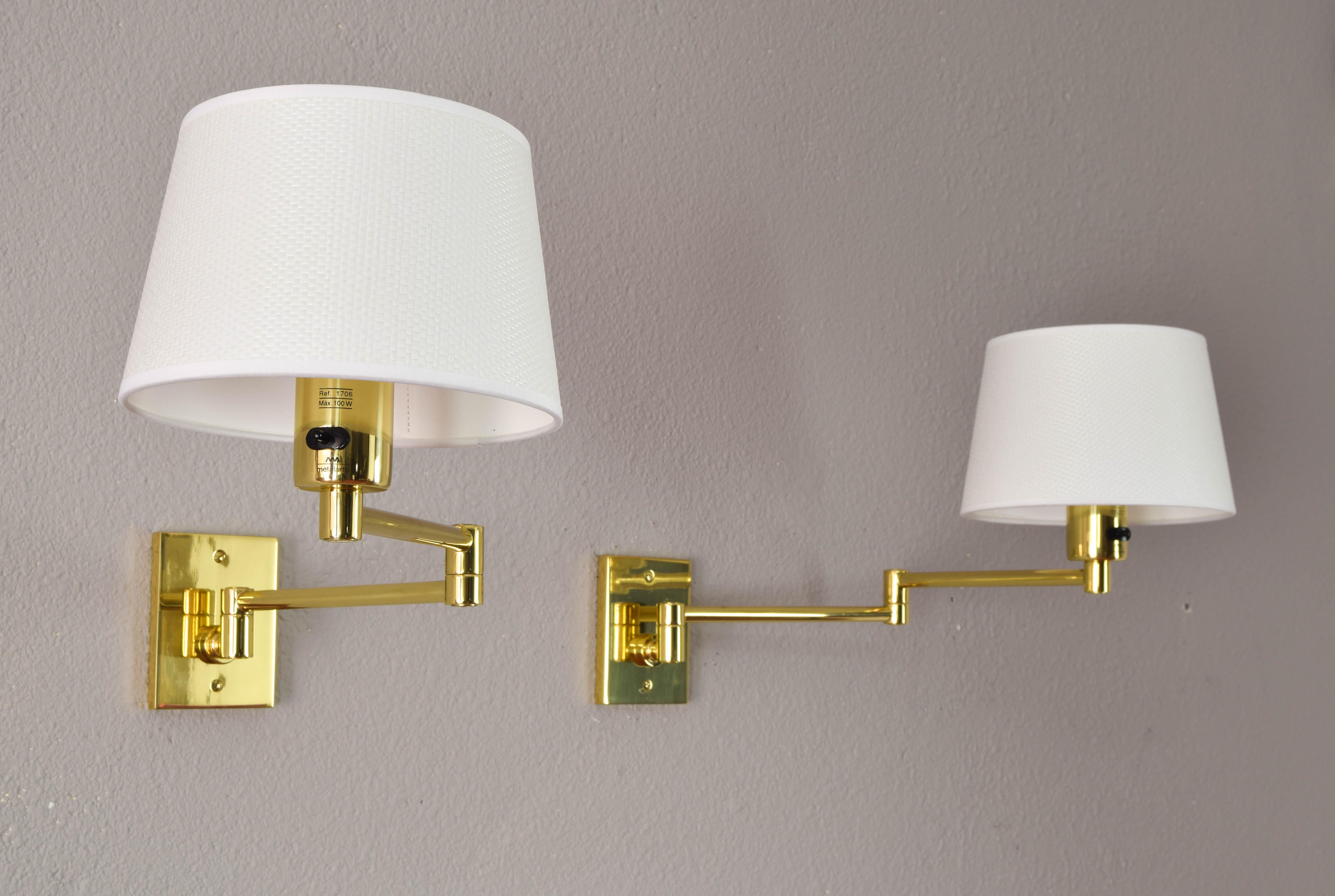20th Century Two Mid-Century Modern Swing Arm Brass Sconces by George W Hansen for Metalarte