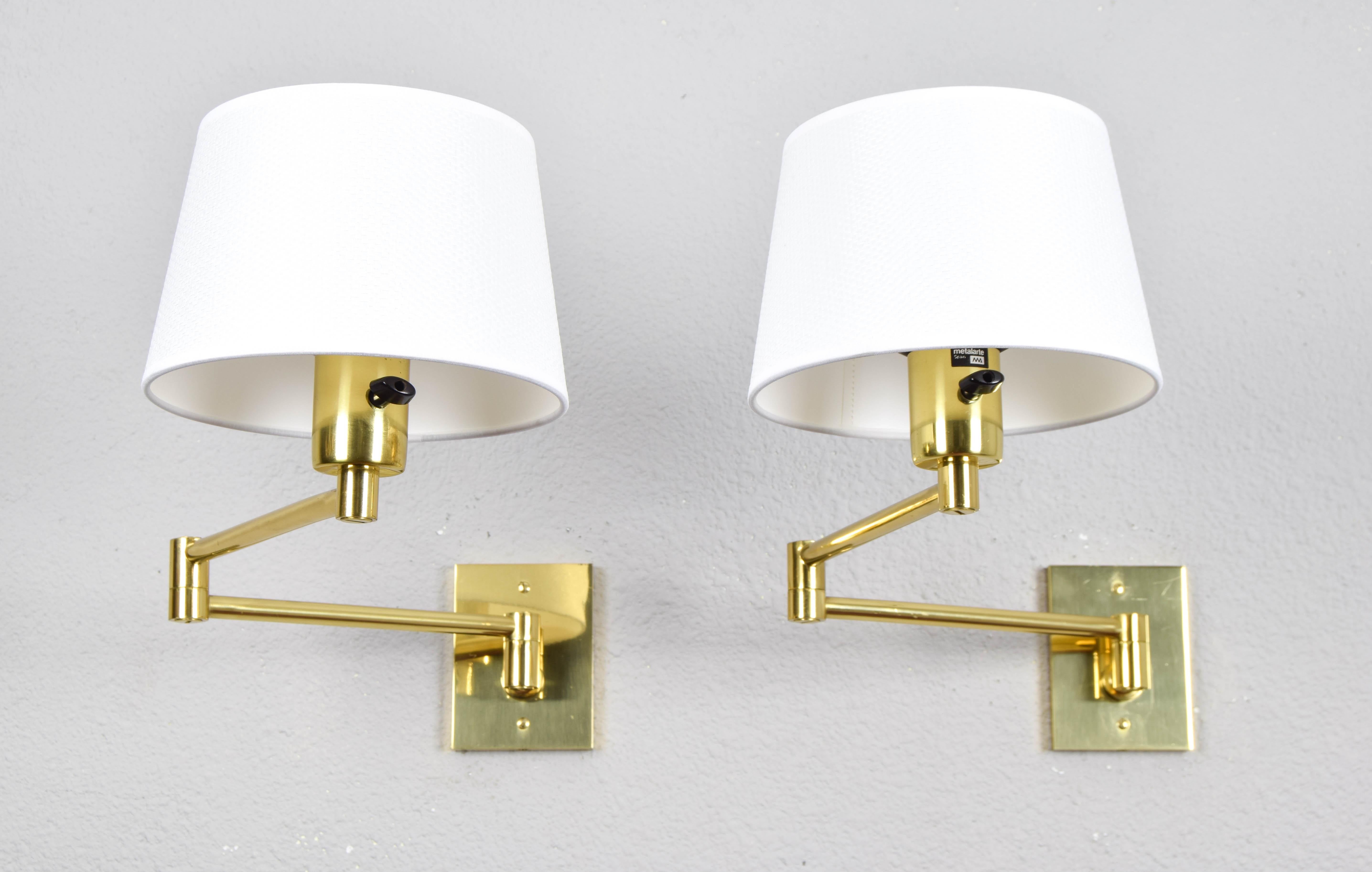 Late 20th Century  Two Mid-Century Modern Swing Arm Brass Sconces by George W Hansen for Metalarte