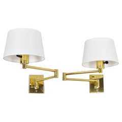 Two Mid-Century Modern Swing Arm Brass Sconces by George W Hansen for Metalarte