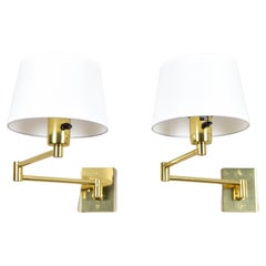 Two Mid-Century Modern Swing Arm Brass Sconces by George W Hansen for Metalarte