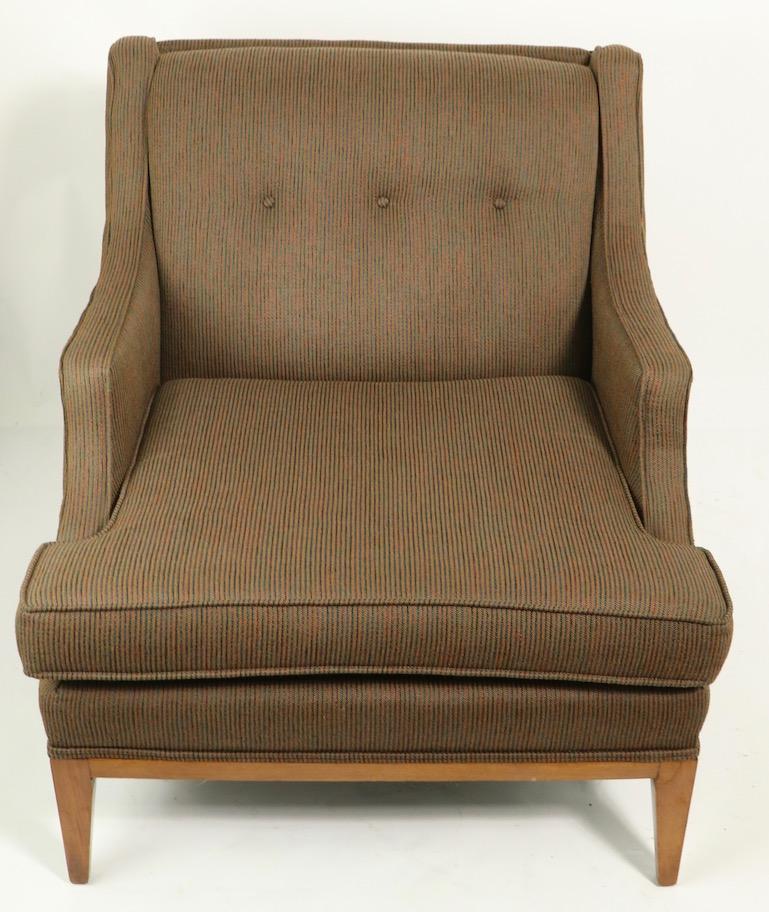 Stylish, comfortable and chic Mr. and Mrs lounge, club chairs attributed to noted English furniture maker Gimson and Slater. Both are in very clean ready to use condition, from a smoke free, pet free home. Well, crafted solid wood frames, tied