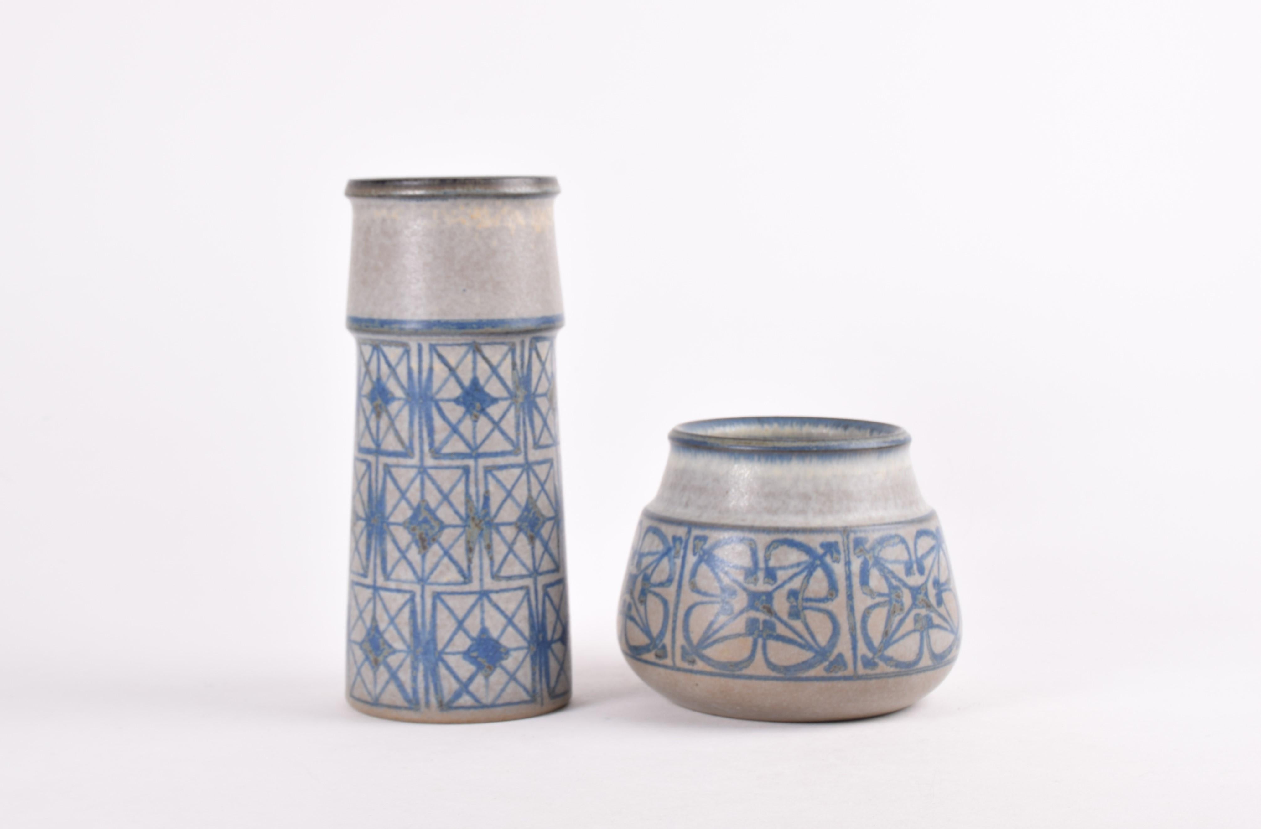 Set of two midcentury Danish vases designed by Marianne Starck for Michael Andersen & Søn and made circa 1960s. Both vases are made of stoneware and belong to the same series.

They both have a matte gray, blue and brownish glaze.

Tall vase: