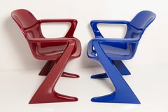 Two Mid-Century Burgundy Red and Blue Kangaroo Chairs Ernst Moeckl Germany, 1968