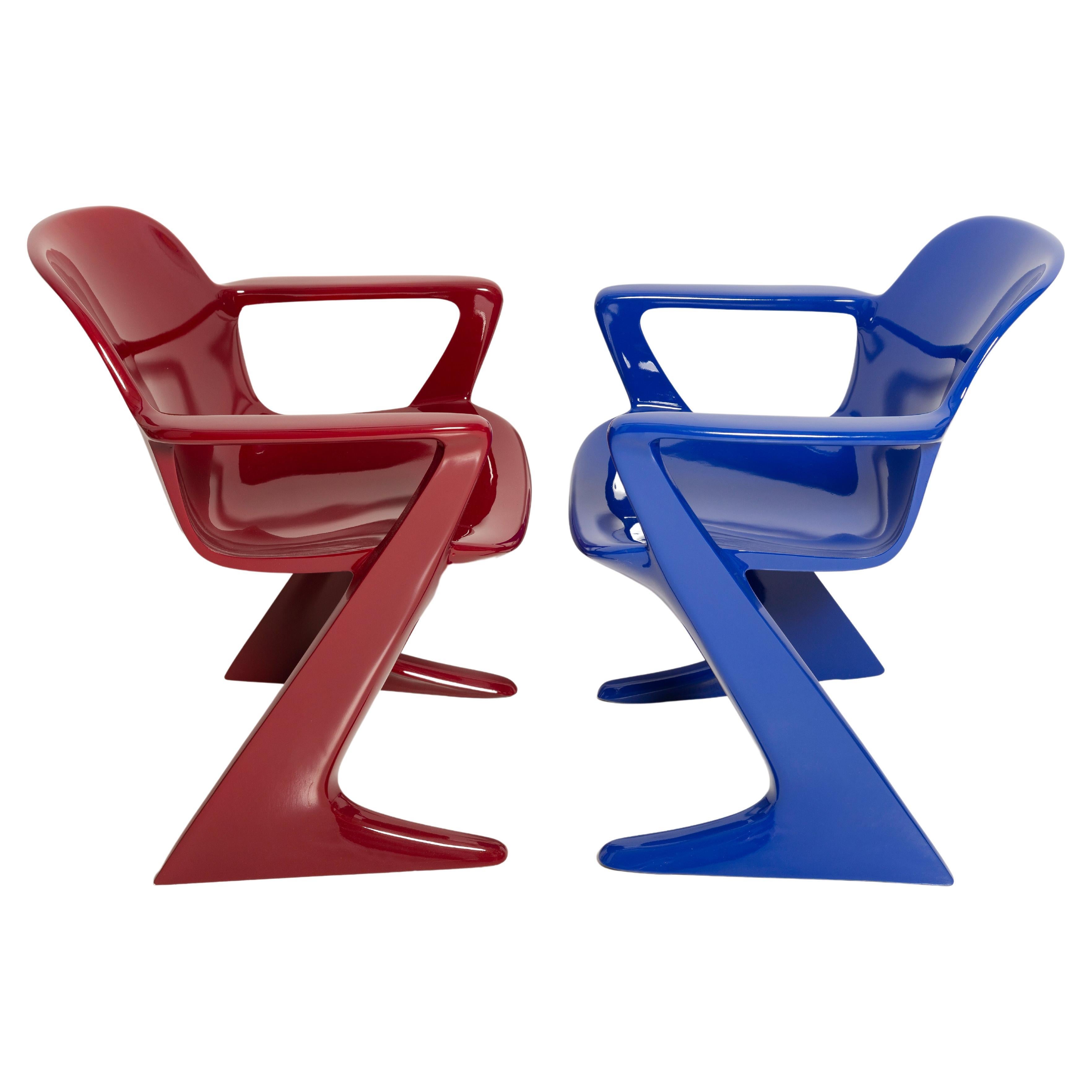 Two Mid-Century Burgundy Red and Blue Kangaroo Chairs Ernst Moeckl Germany, 1968 For Sale