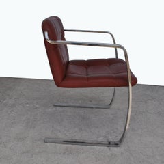 Rare paire de fauteuils Cumberland en acier inoxydable et cuir