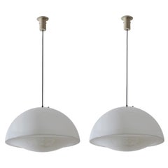 Two Model 4461 A "Drop" Suspension Lights by Tito Agnoli for Oluce
