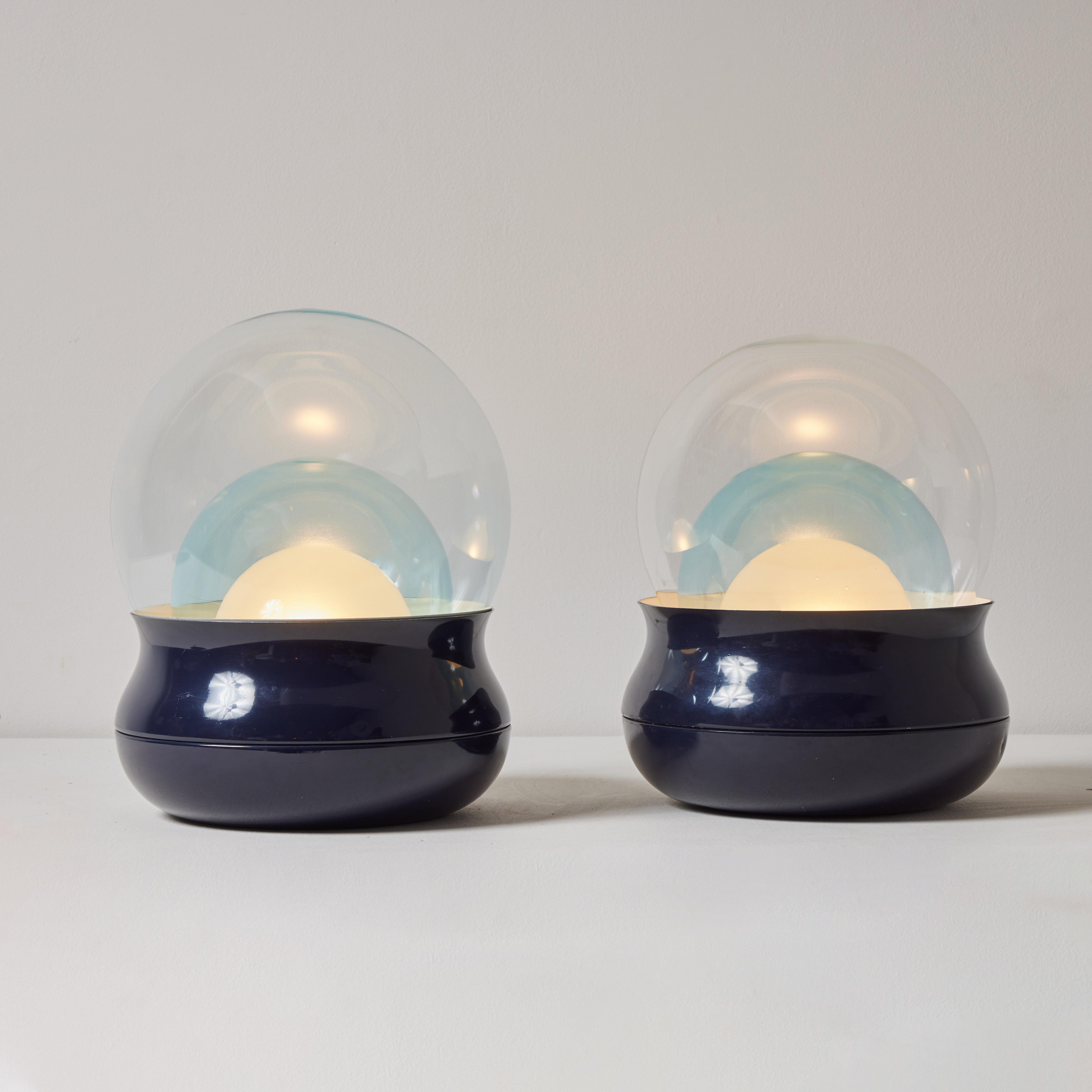 Two model TL278 table lamps by Giorgio Longoni for Stilnovo. Manufactured in Italy, 1968. Enameled aluminum, opaline glass, colored crystal. Original Stilnovo cord. Retains original manufacturer's stamp. We recommend one E27 60w maximum bulb per