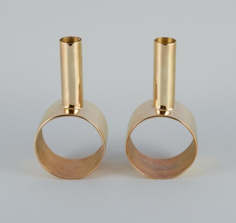 Swedish design. A pair of modernist brass candlesticks.
Handmade.
Late 1900s.
Dimensions: H 16.0 x W 8.0 x Depth 5.0 cm.
Fits candles with a diameter of 2.3 cm.

