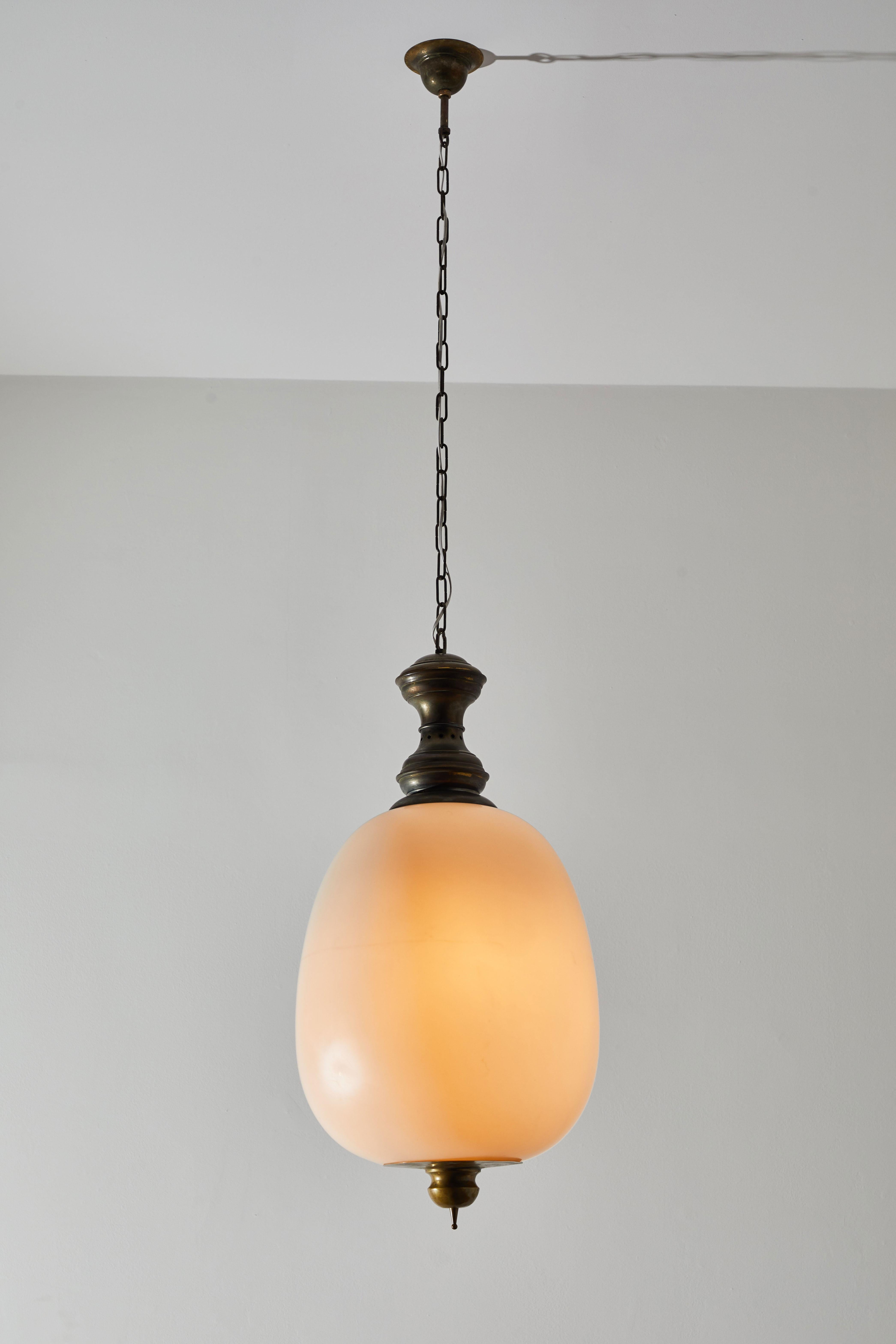 Single monumental pendant by Caccia Dominioni for Azucena. Designed and manufactured in Italy circa 1950s. Brass with brushed satin glass diffusers. Rewired for US junction boxes. Custom brass ceiling plate. Takes three E27 60w maximum Edison bulbs.