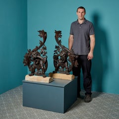 Two Mounted Antique Carved Oak Sculptures