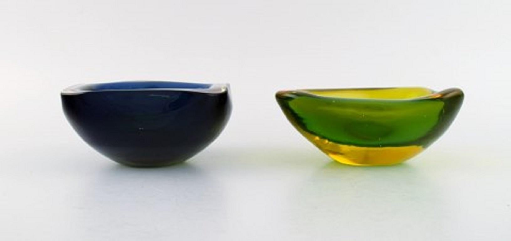 Two Murano bowls in blue and green-yellow mouth-blown art glass. Italian design, 1960s.
Largest measures: 17 x 7 cm.
In perfect condition.