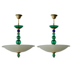 Due lampadari in vetro di Murano e ottone di F. Fabbian