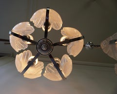 Due lampade a sospensione in vetro di Murano e cromo