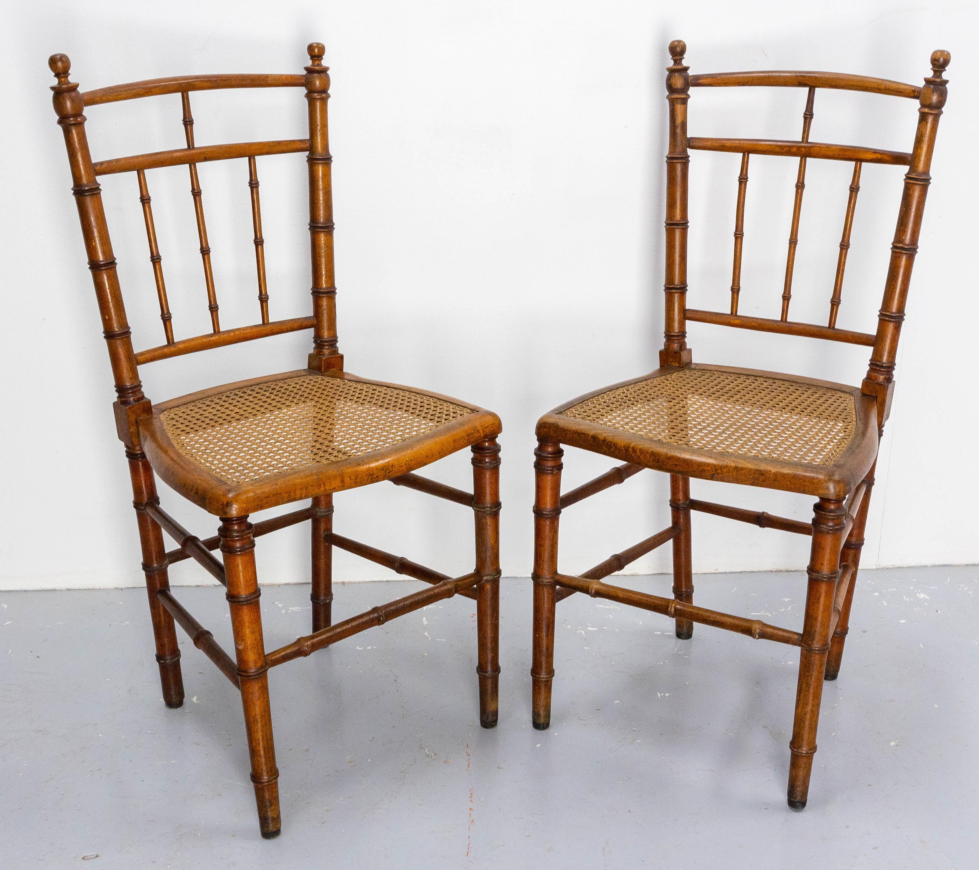 Two french chairs Napoleon III, made circa 1880. 
Beech and cane in faux-bambou style.
Antique, late 19th century.
Sound and solid.

Shipping:
L42 / H 89 / P 55 cm 13 kg.