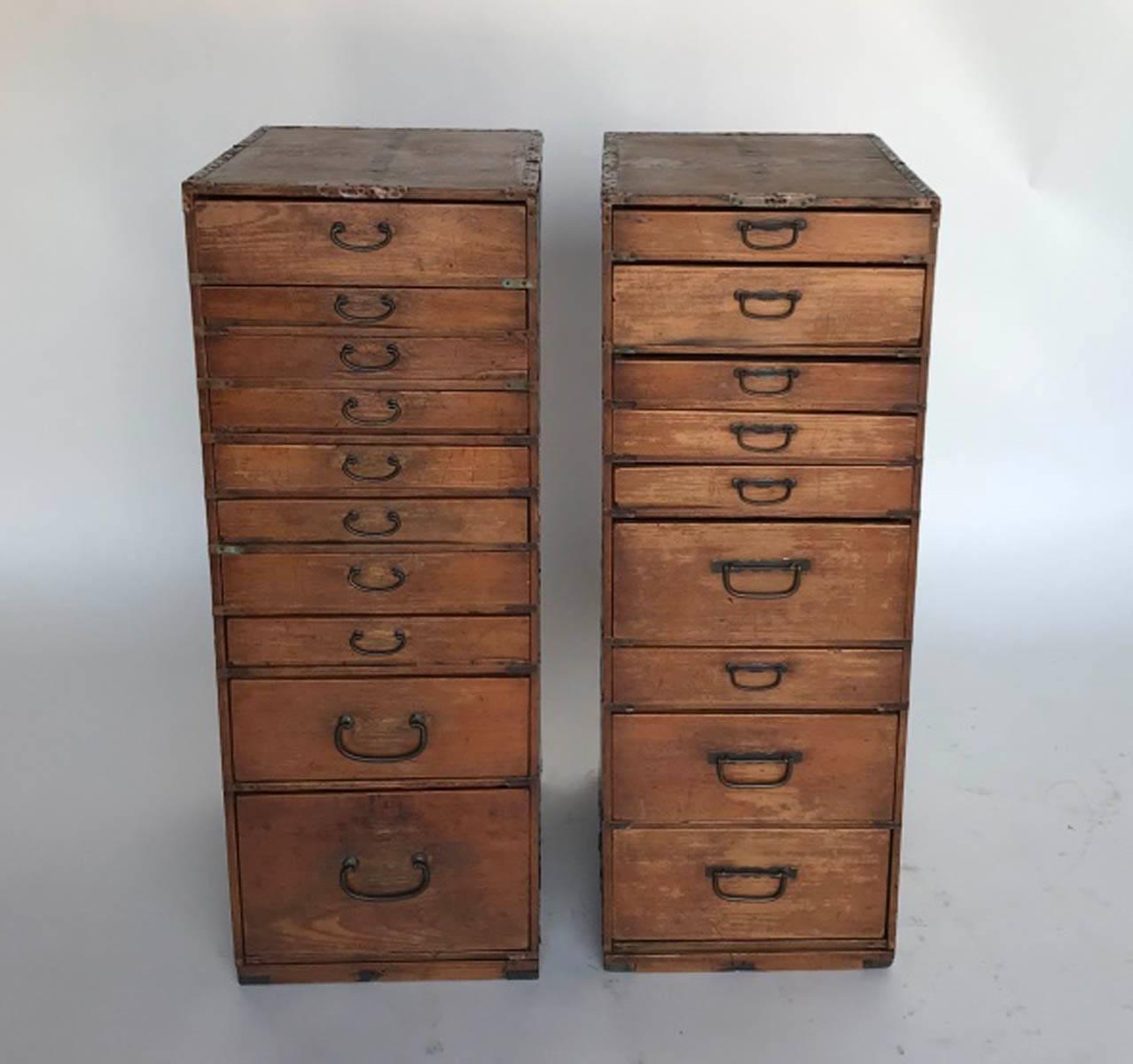 These are two old shop cabinets from Japan. Hinoki wood. Shallow drawers with metal pulls. All original hardware. They are the same overall size but not matching. Drawer depth and pulls are different on each one. Perfect for jewelry or other small