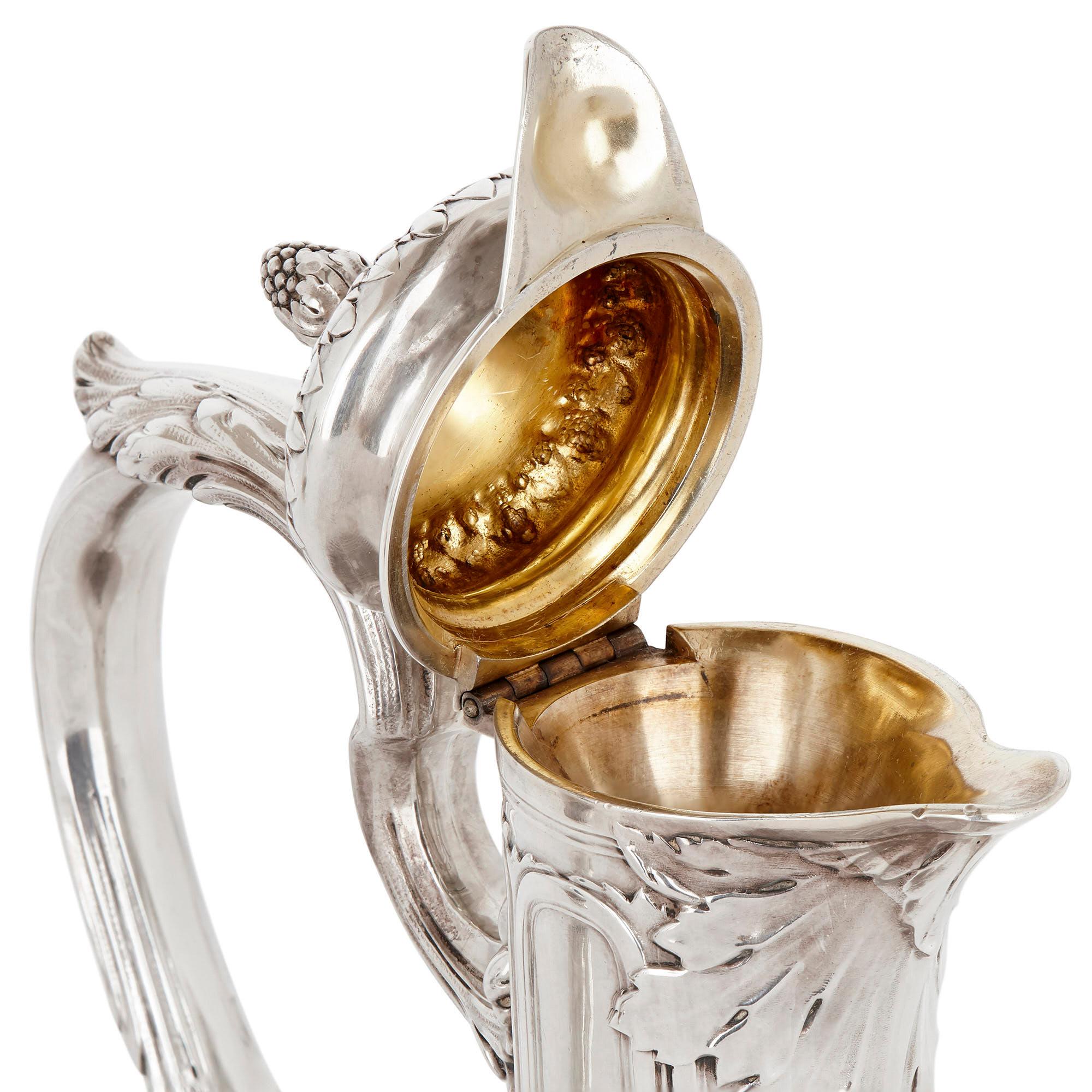 Two Neoclassical Style Silver and Crystal Claret Jugs 1