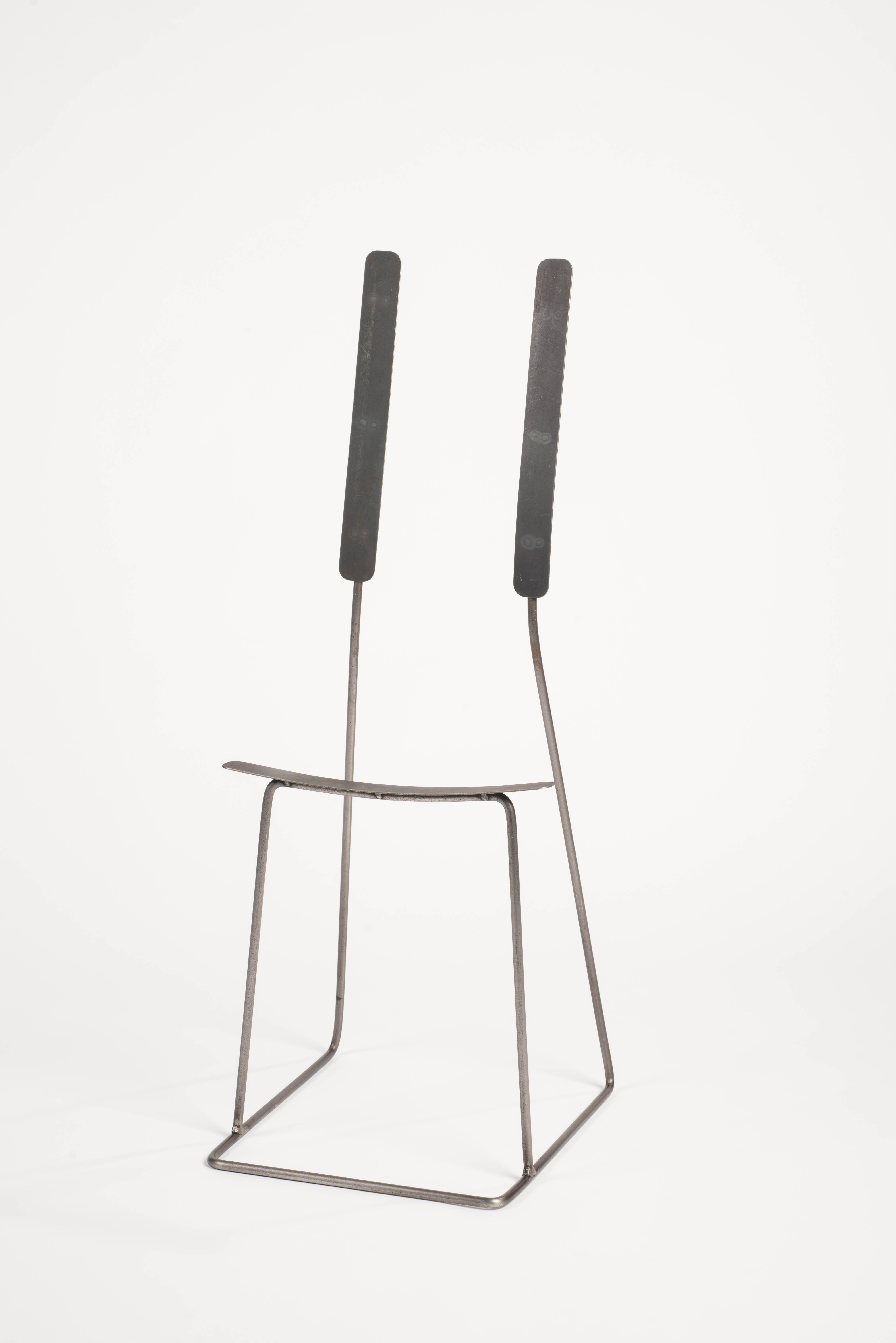Two Notes chair by Neil Nenner
Punctuation Marks
Dimensions: H96 x L 40 x W 35 cm
Materials: Steel tubes and rods with a natural finish
 Corten sheets 
 
Neil Nenner (b.1977, Kibbutz Mevo Hama), Independent designer / Artist and lecture in