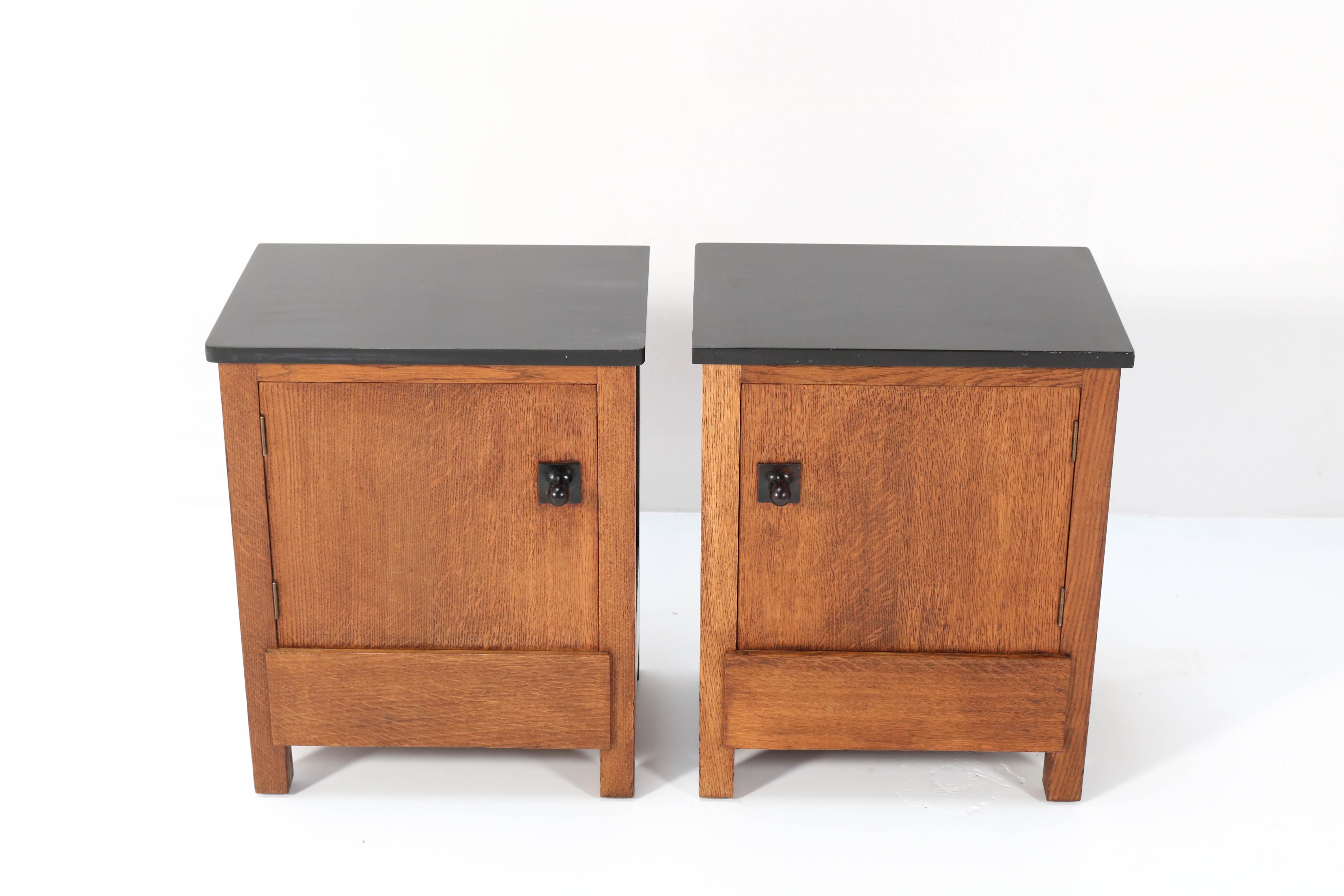 Magnificent and rare pair of Art Deco Haagse School nightstands or bedside tables.
Design by Henk Wouda for H. Pander & Zonen.
Striking Dutch design from the 1920s.
Marked with original manufacturers metal tag and brand mark.
In very good