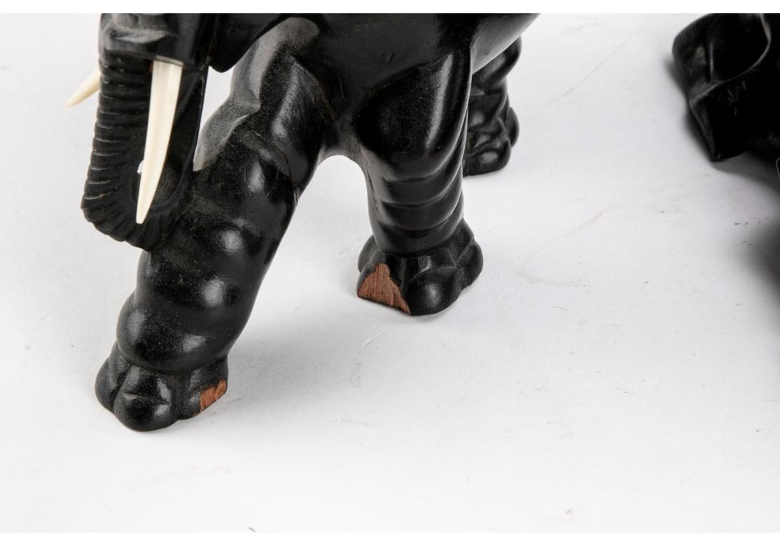 Two Opposing Ebonized Elephant Figures With Stands In Fair Condition For Sale In Bridgeport, CT