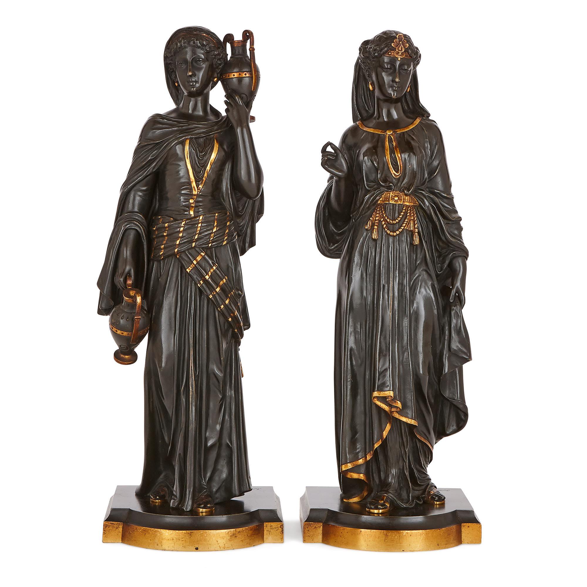 These beautiful sculptures were crafted in Austria in the early 20th century. They are signed, ‘Nam Greb’, after the famous ‘Bergman’ Viennese bronze foundry. 

Cast in the Bergman style, the Orientalist sculptures depict two women in Egyptian