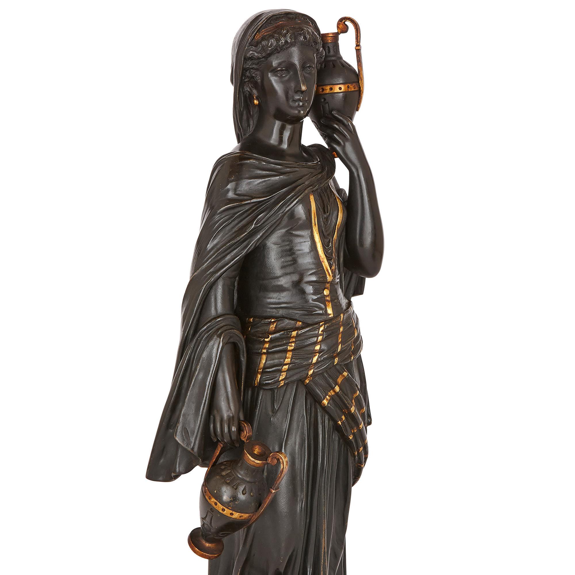 Égyptien Deux sculptures orientalistes en bronze doré et patiné d’après Bergman en vente