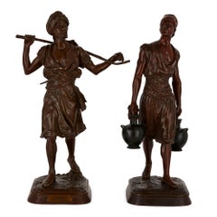 Two Orientalist Patinated Bronze Sculptures by Debut and Pinedo