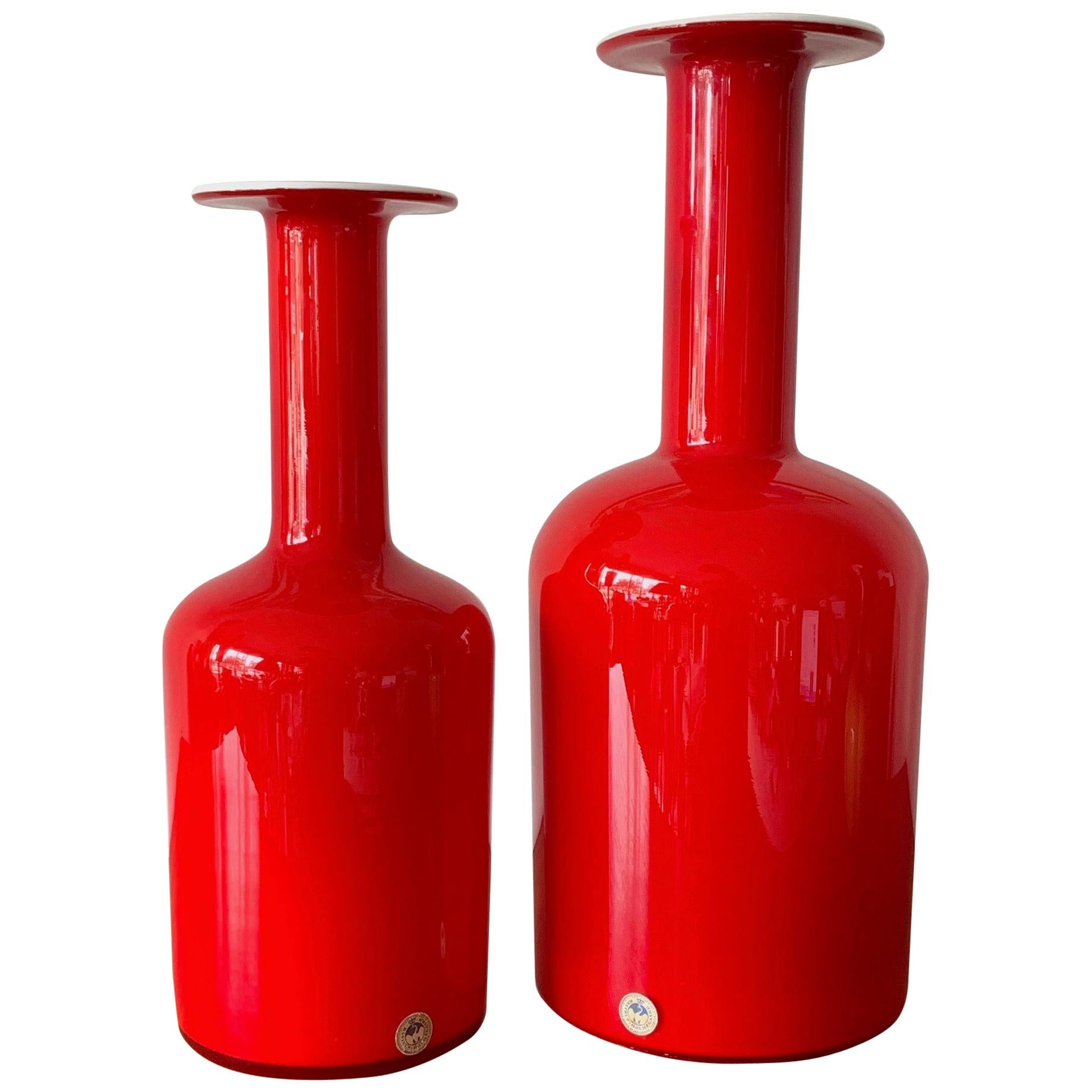 Two Otto Bauer Holmegaard Red Bottles