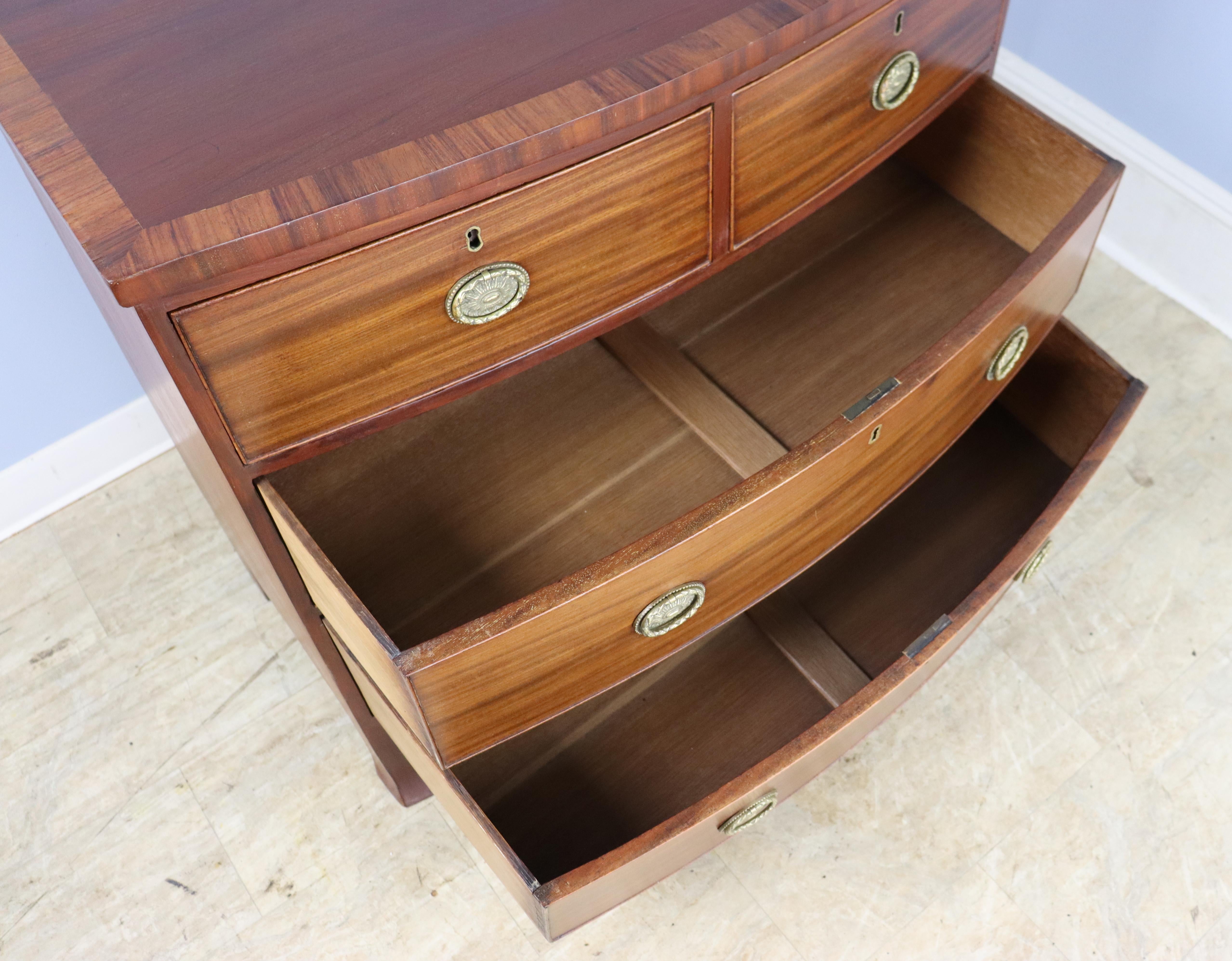 Two-over-two Mahogany Bowfront Chest with Original Feet and Brasses For Sale 7