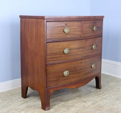 Two-over-two Mahogany Bowfront Chest with Original Feet and Brasses
