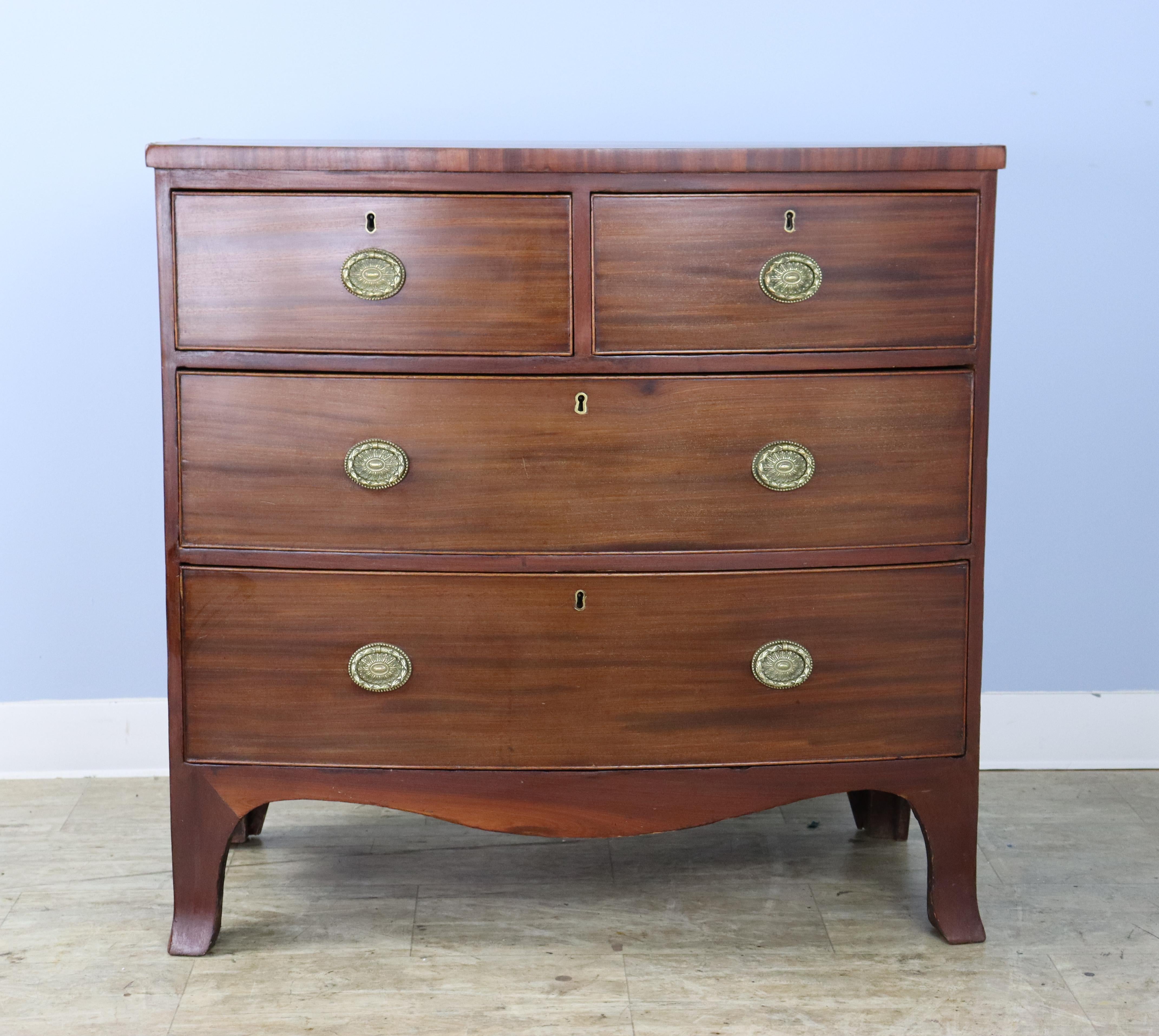 English Two-over-two Mahogany Bowfront Chest with Original Feet and Brasses For Sale