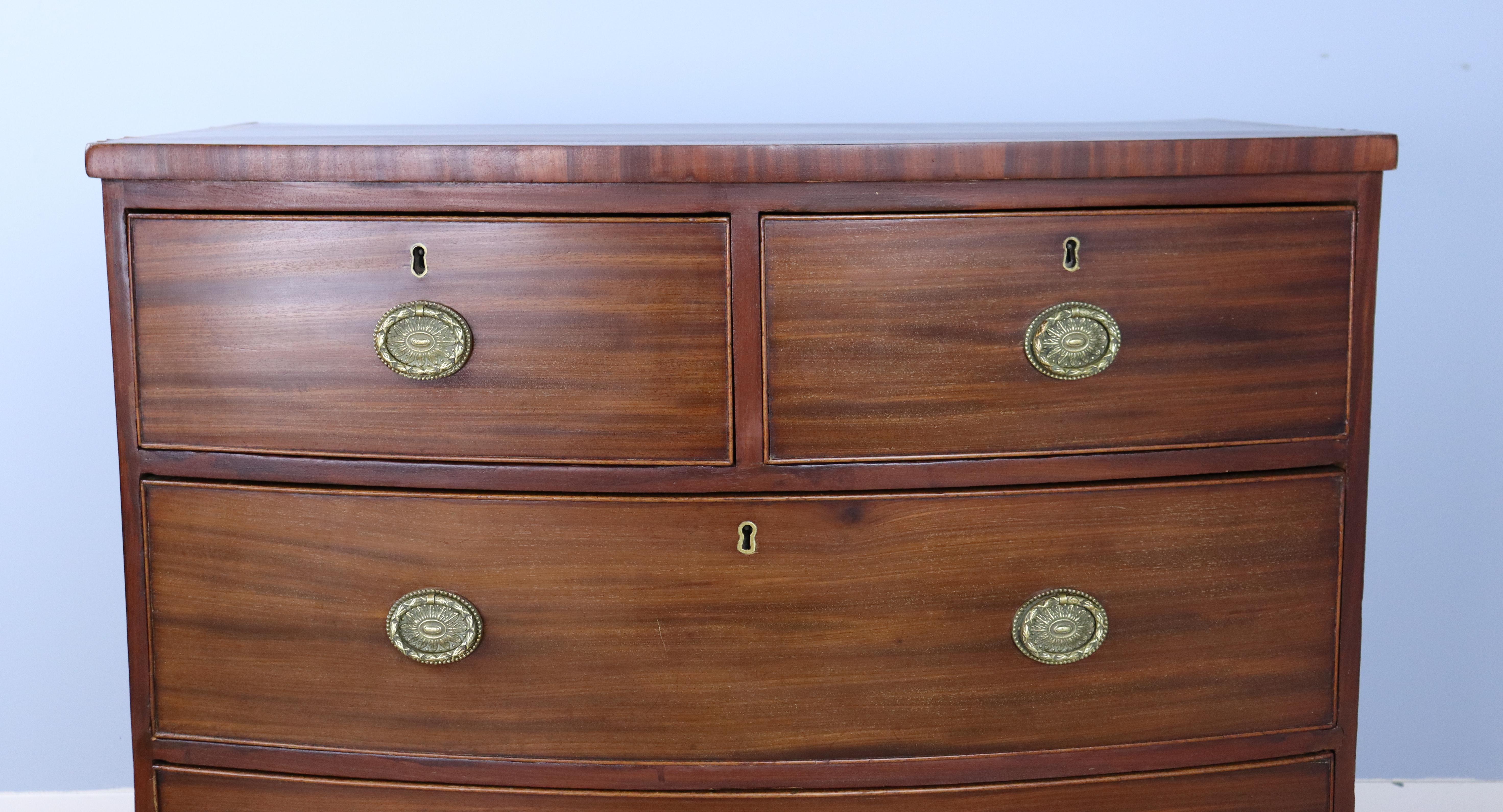 19th Century Two-over-two Mahogany Bowfront Chest with Original Feet and Brasses For Sale