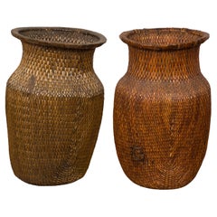 Two Oversized Chinese Rattan Grain Baskets with Flaring Necks, Sold Each