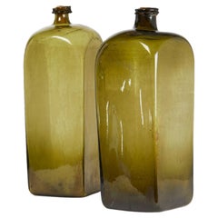Two Oversized Olive Glass Case Gin Bottles