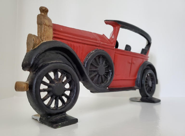 Two Painted Cast Iron Antique Car Door Stops or Book Ends For Sale at