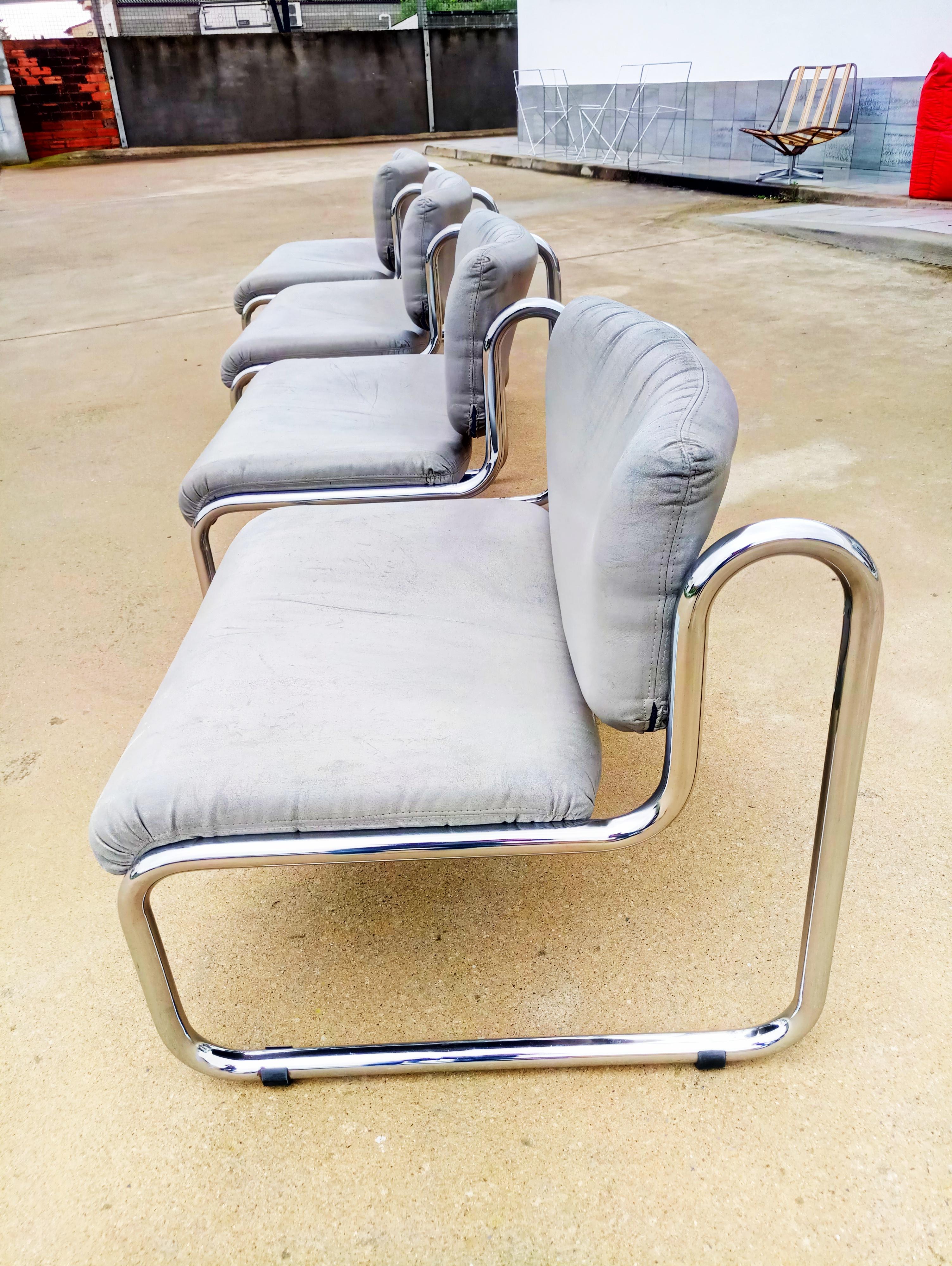 Beautiful and rare set of four gray leather lounge armchairs manufactured in Italy in 1970. Very good quality of workmanship with a beautiful original leather and that beautiful patina. The chrome, foam seats, and leather are in perfect condition.