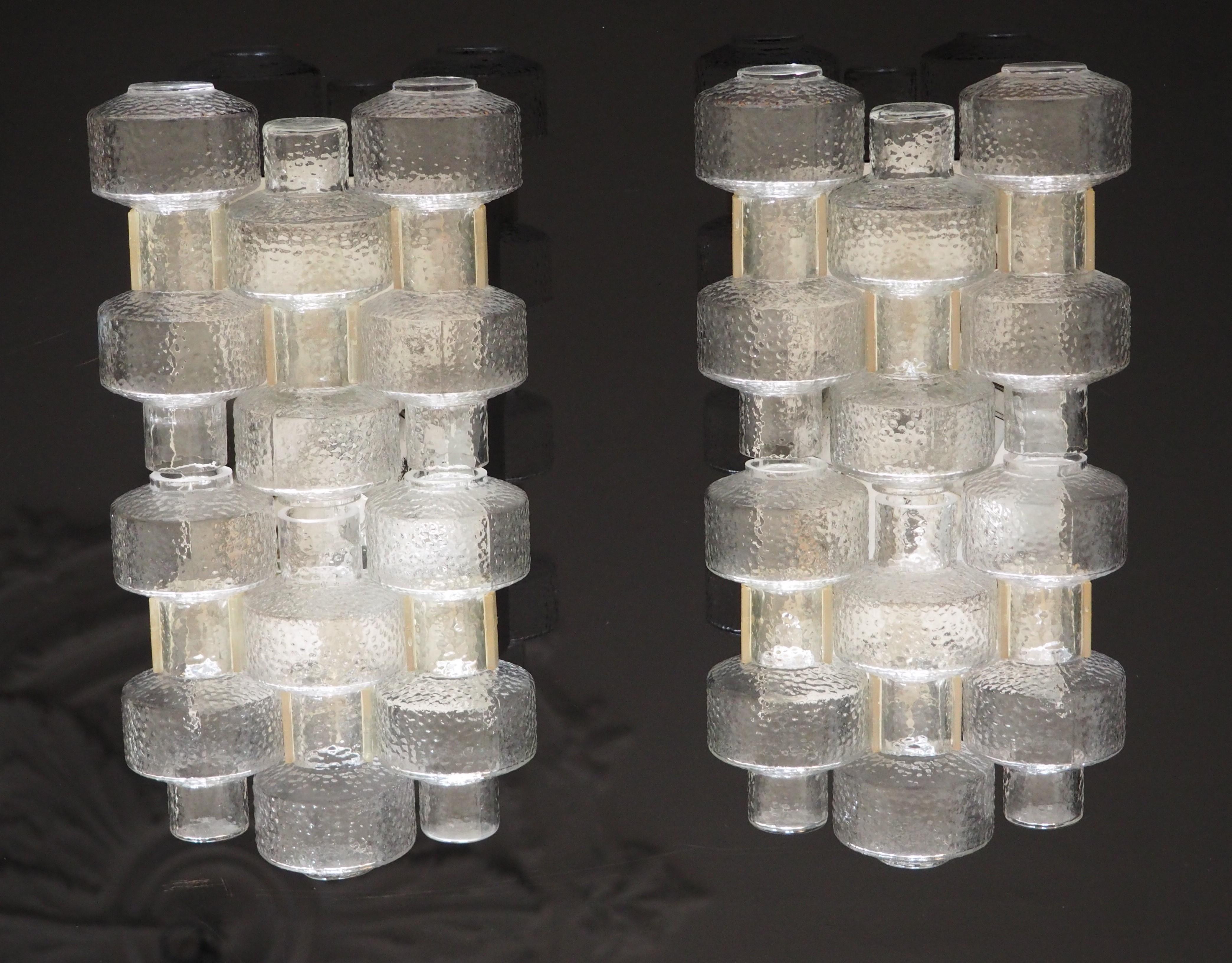 A rare set of four  mid - century glass and aluminium wall sconces designed by Gert Nyström for Orrefors, Sweden, circa 1950s.

Socket: each 2 x E27 or E26 (US) for standard screw bulbs.




   