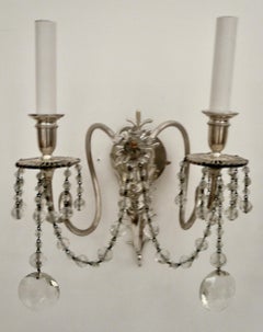 Two Pairs E. F. Caldwell Silvered Bronze and Crystal Winged Putti Sconces