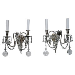 Two Pairs E. F. Caldwell Silvered Bronze and Crystal Winged Putti Sconces