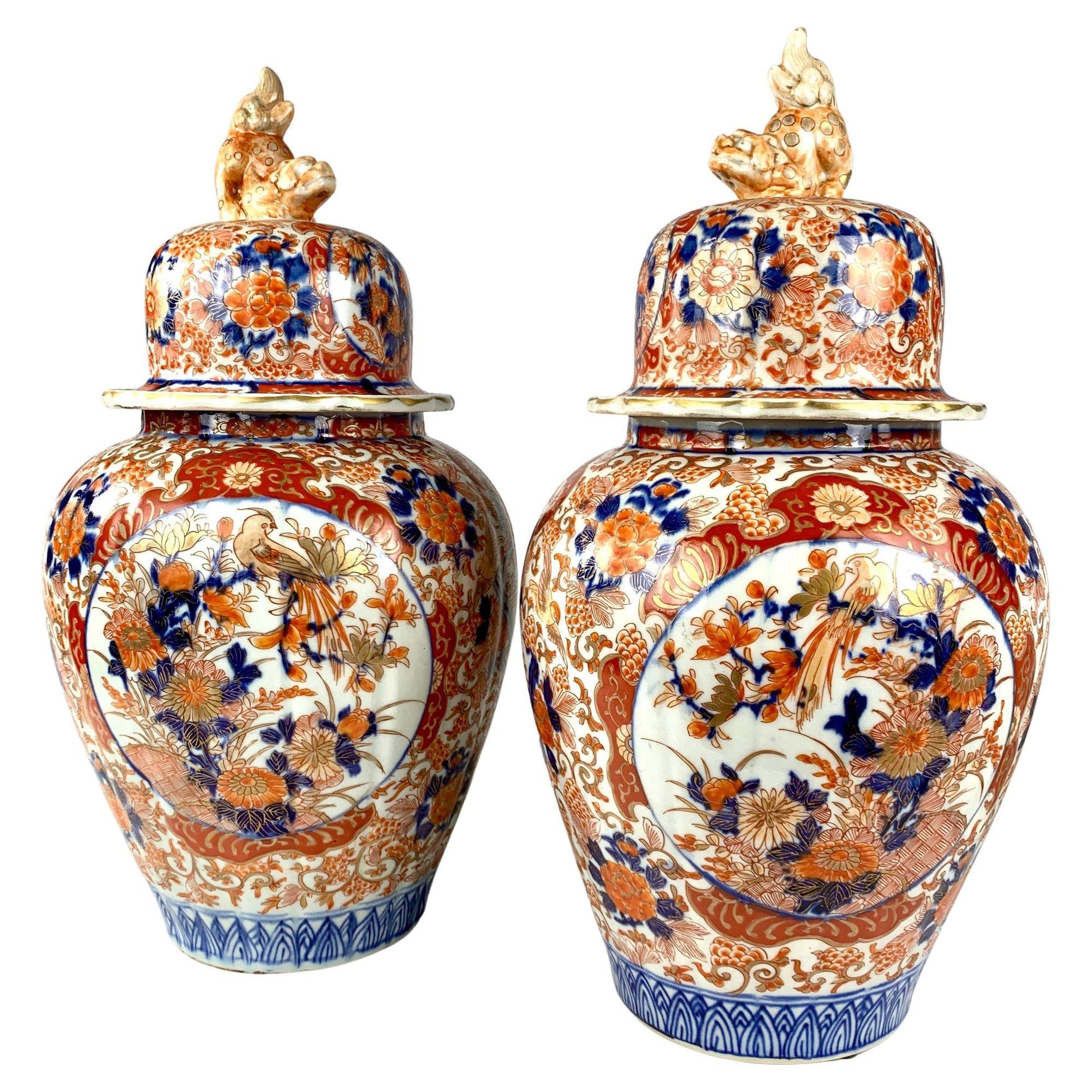 Two pairs of Imari jars.
Price for the four jars: $7,200
Pair 1 (in front of pair 2)
Hand-painted in Imari designs, both jars show beautiful waterside scenes in cobalt blue, gilt, and two tones of iron red. The colors are exquisite and intense.