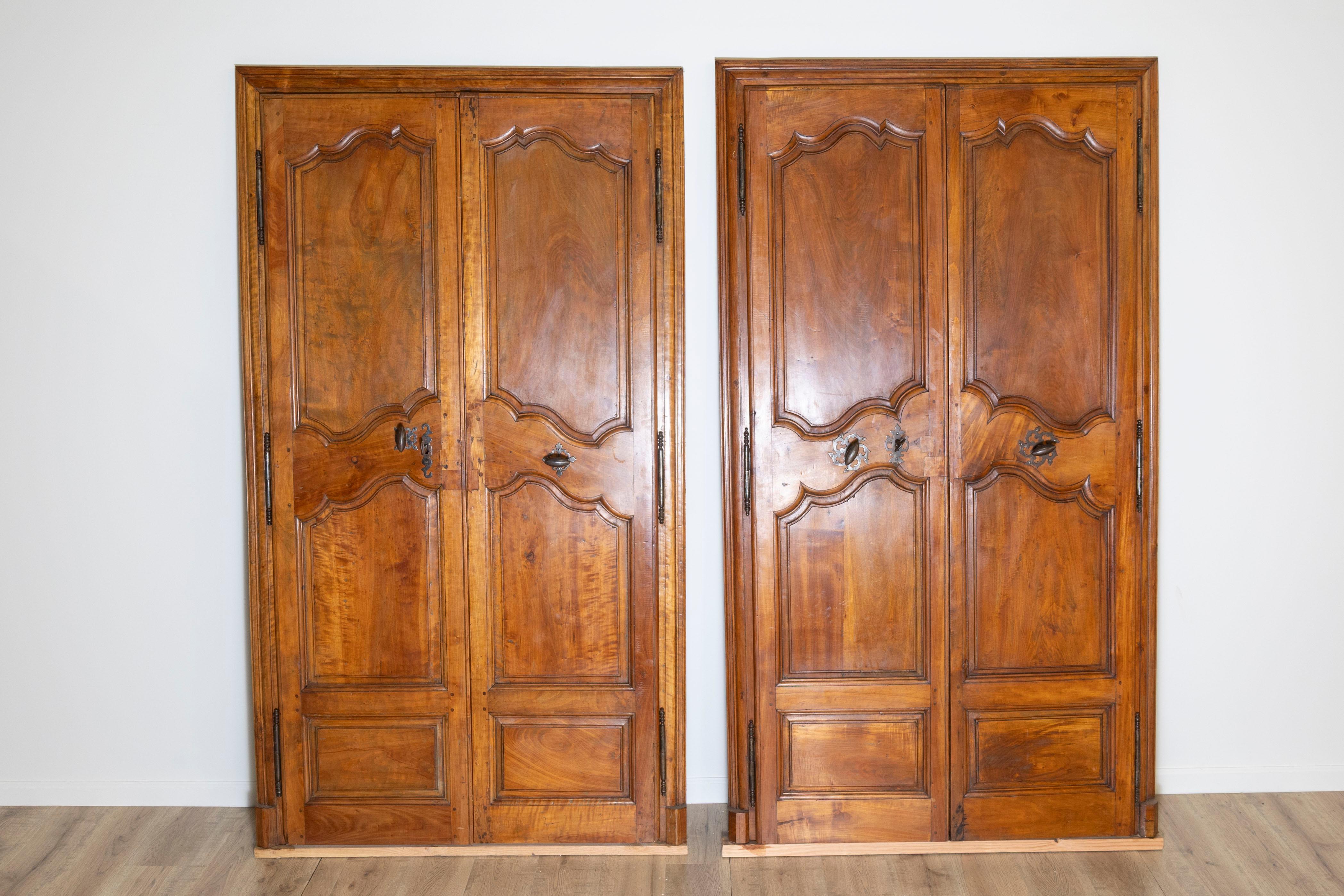 These two pairs of 18th Century French communication doors are masterfully crafted from walnut, showcasing the wood’s natural warmth and rich grain. Originating from Avignon, these doors embody the sophisticated elegance of French provincial design