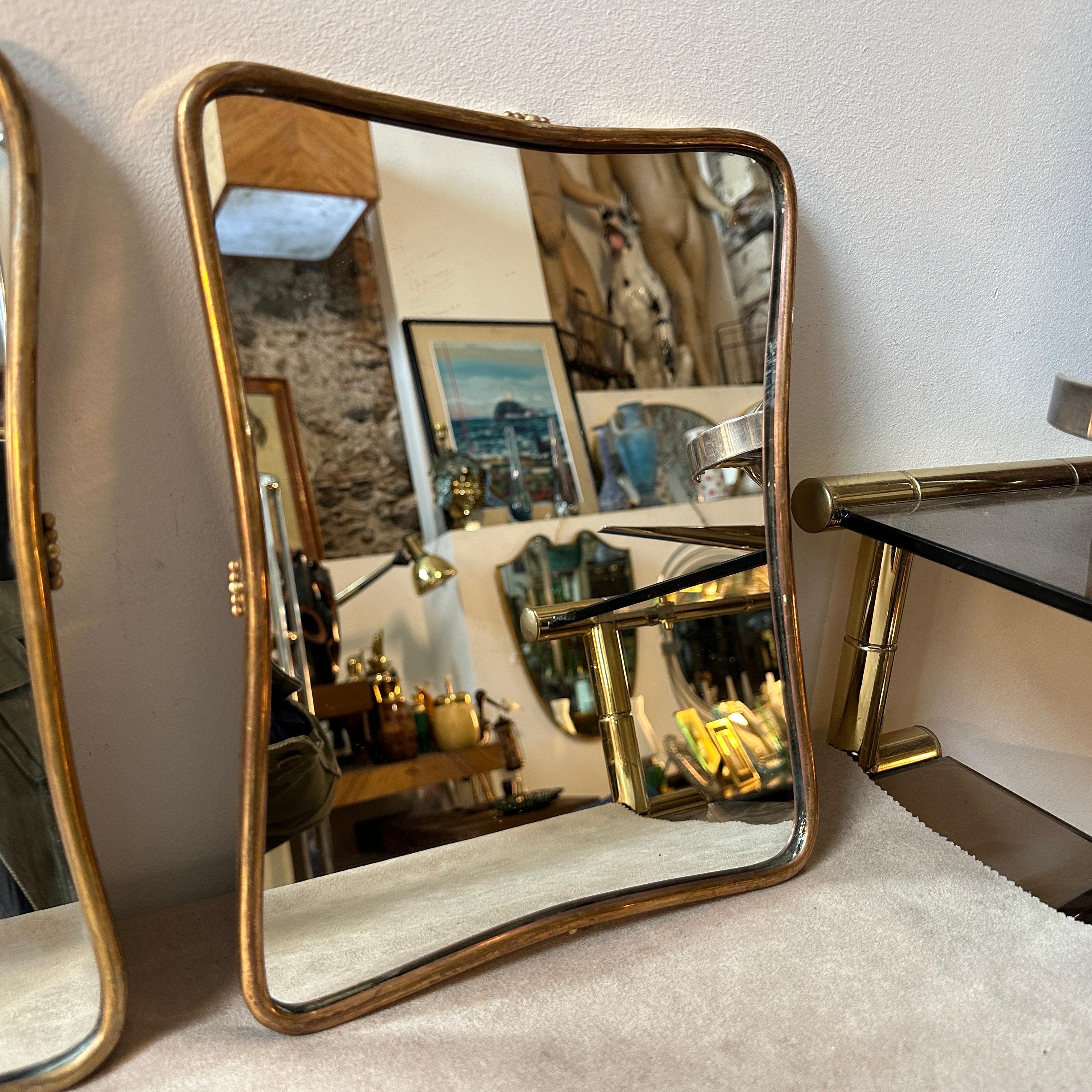 Italian A pair of 1950s Gio Ponti Style Mid-Century Modern Brass Small Wall Mirrors For Sale