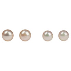 Two pairs of cultured pearl gold earrings