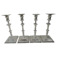 Two Pairs of English Mid-Century Georgian Sterling Silver Candlesticks
