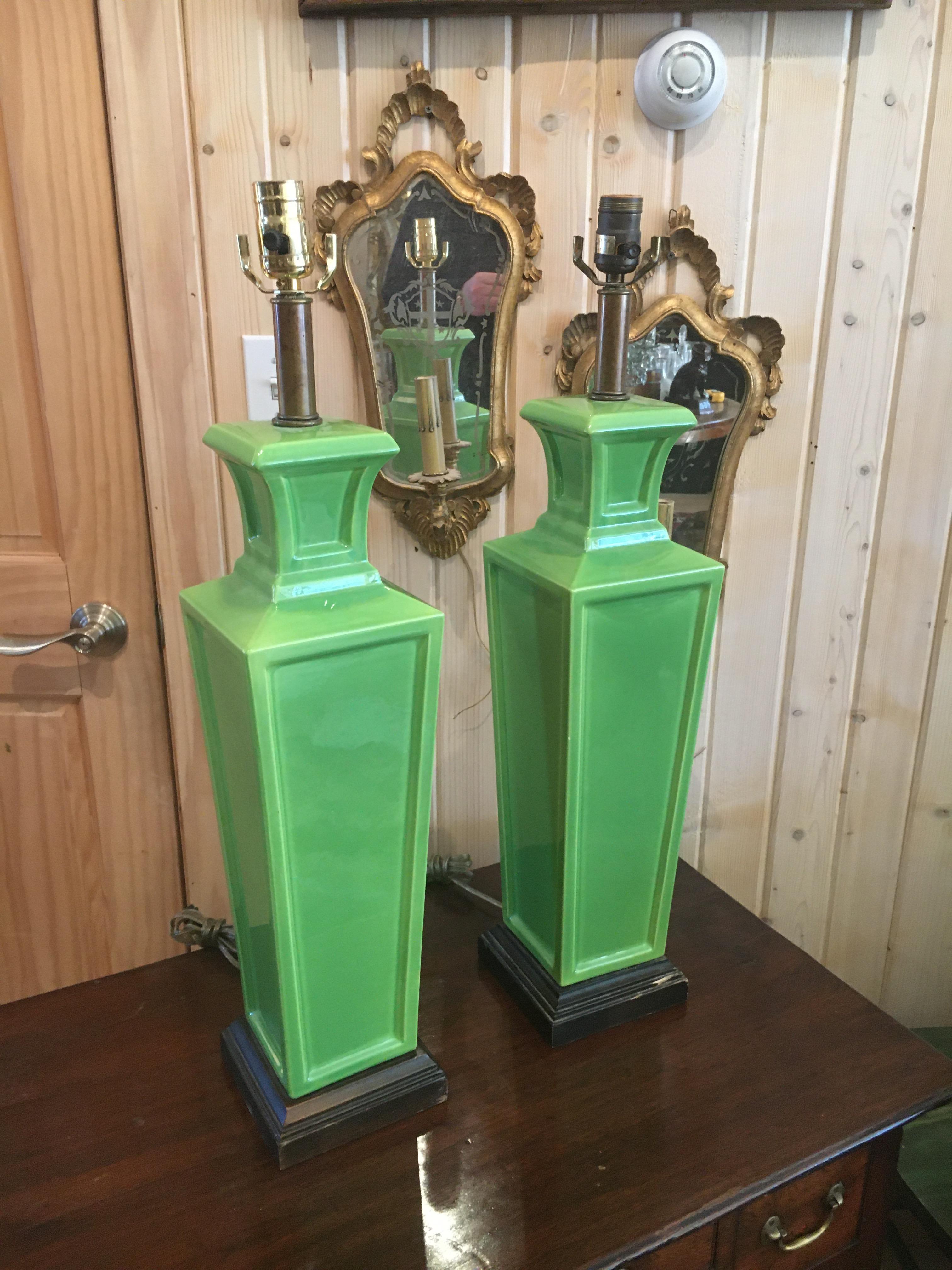 Two pairs of Frederick Cooper ceramic table lamps, great apple green color on one pair and burnt umber on the other pair. Priced per pair. Measurement is for apple green pair.