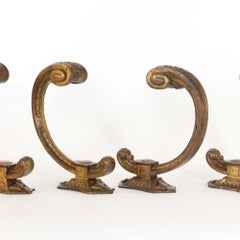 Two pairs of French antique 19th century ormolu curtain tie backs