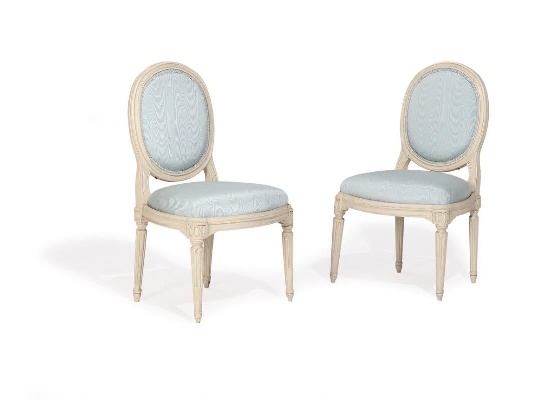 A pair of French white painted Louis XVI armchairs and chairs(4pcs). Signed Nadal. Maker Jean-René Nadal, 1733-1783.

The regal set of Nadal chairs consisting of two arm chairs and two side chairs are each stamped with the makers name. They are