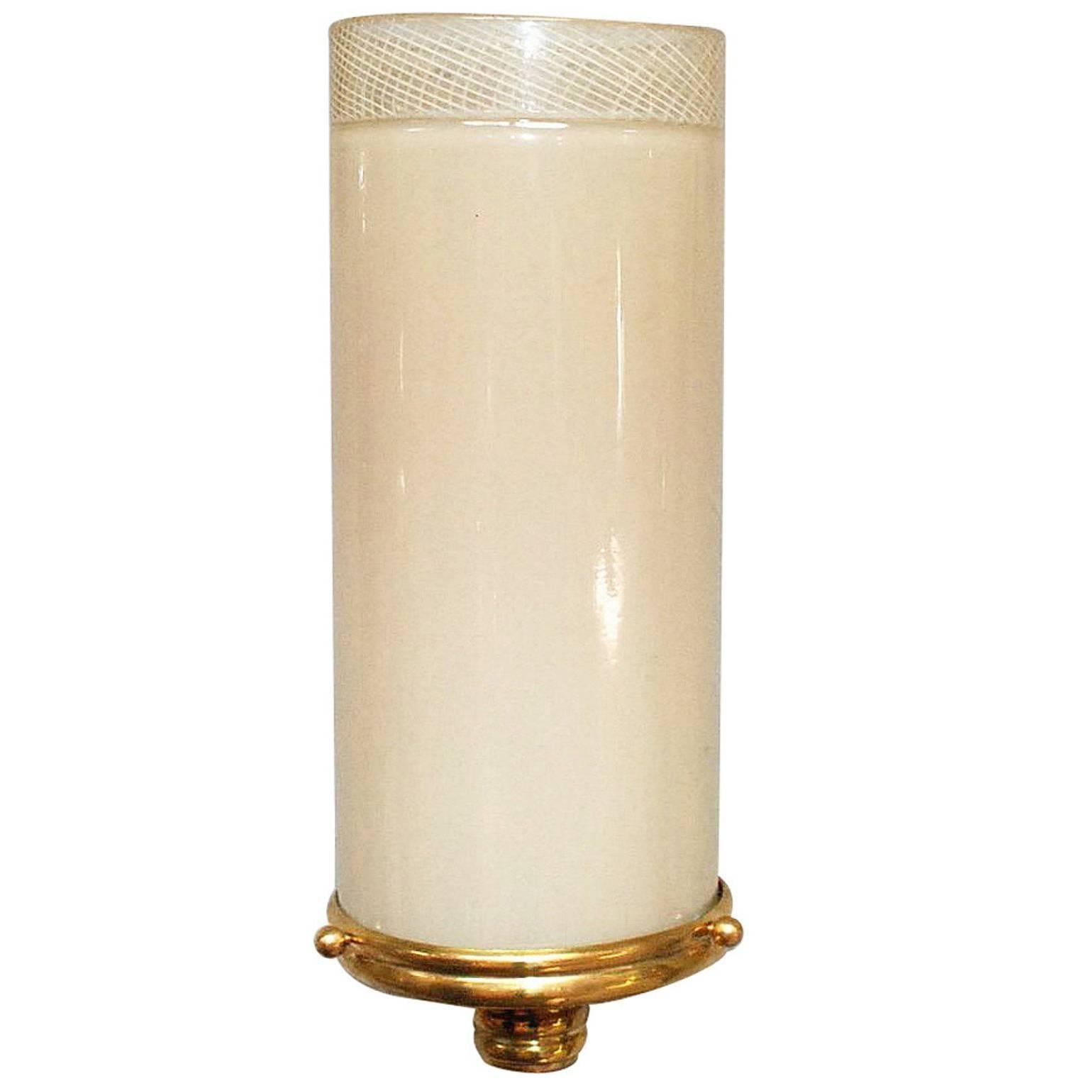 Italian wall lights with soft pink Murano glass hand blown into a tube shade with zig zag patterns in “Reticello” technique, mounted on brass metal frame, designed by Venini, circa 1930s, made in Italy
1 light / E26 or E27 type / max 40W